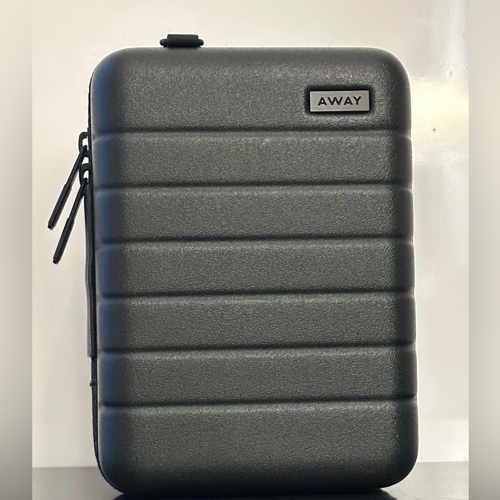 Away travel mini case in forest green.